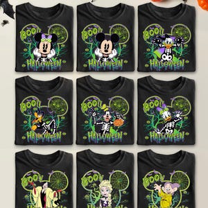 May include: Nine black Halloween-themed t-shirts featuring Disney characters. Each shirt has a character in a skeleton costume with the word "BOO!" and "HALLOWEEN" printed on it. Characters include Mickey, Minnie, Donald, Goofy, and others.