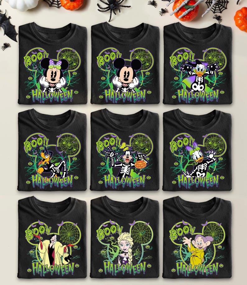 May include: Nine black Halloween-themed t-shirts featuring Disney characters. Each shirt has a character in a skeleton costume with the word "BOO!" and "HALLOWEEN" printed on it. Characters include Mickey, Minnie, Donald, Goofy, and others.