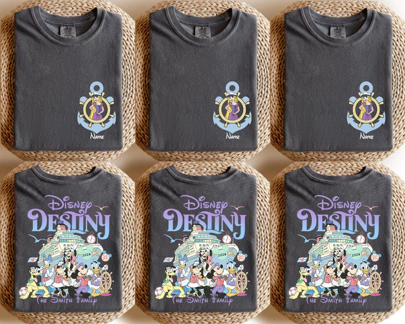 May include: Six dark gray t-shirts. The top row features an anchor design with a character and the name "Name". The bottom row displays "Disney Destiny" with a cruise ship and characters, and "The Smith Family".