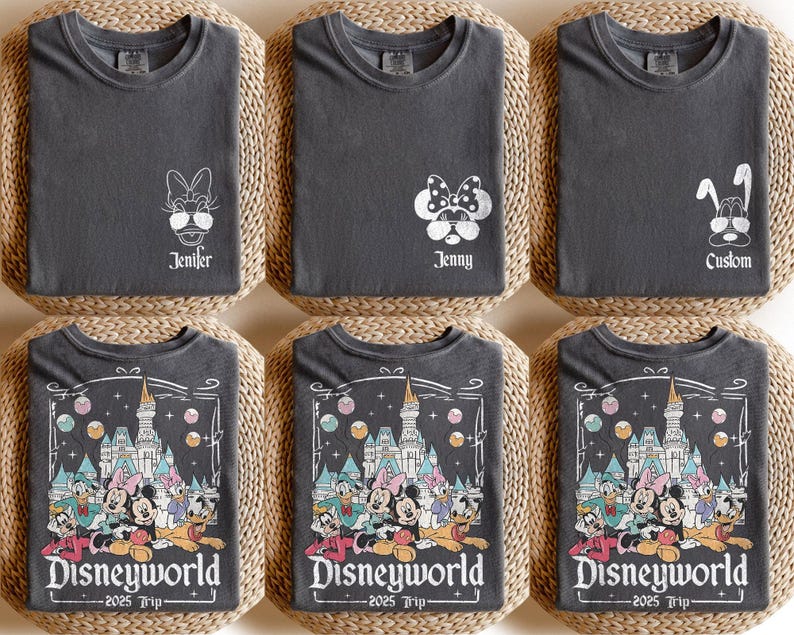 May include: Three gray t-shirts with different designs. The first shirt has a white outline of a character with sunglasses and the text "Jennifer". The second shirt has a white outline of a character with sunglasses and the text "Jenny". The third shirt has a white outline of a character with ears and the text "Custom". The bottom three shirts have a black and white illustration of a castle and characters with the text "Disneyworld - 2025 Trip".