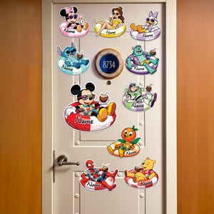 May include: A white door decorated with colorful cartoon character decals, each lounging in a pool float with a drink. Characters include Mickey Mouse, Minnie Mouse, Stitch, and others. A circular plaque displays the number 8734.