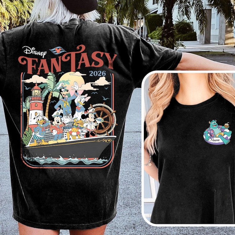 May include: Black t-shirt with a vibrant graphic of Disney characters on a cruise ship, including the text "Disney Fantasy 2026." The shirt also features a small cartoon character graphic on the front.