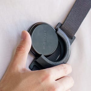 Soporte para tapa de lente, bolsa o correa para cámara Fujifilm X100 (v2)