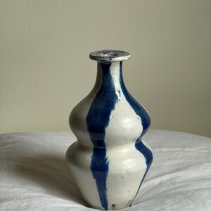 Blue and white wheel thrown stoneware ceramic vase