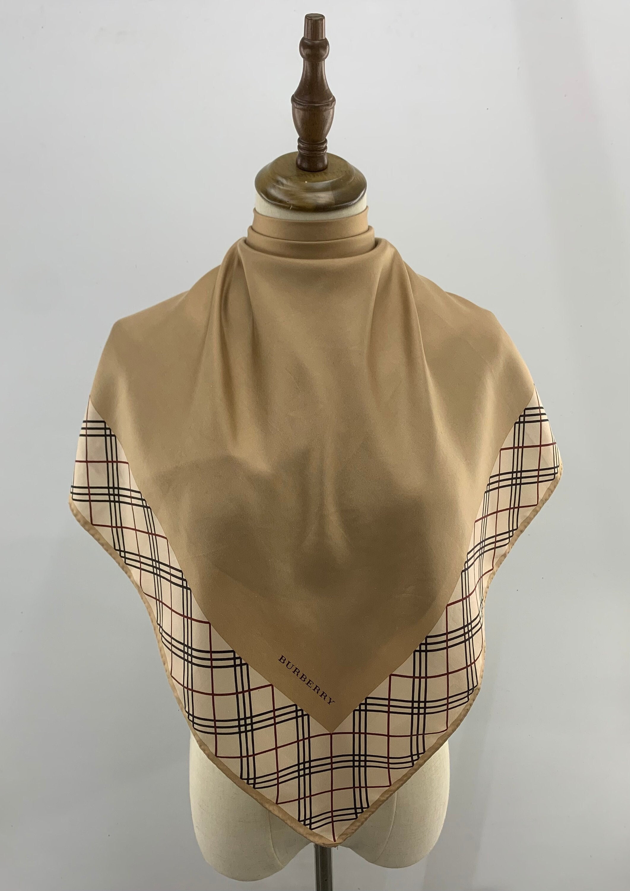 Burberry clearance bufanda juntos
