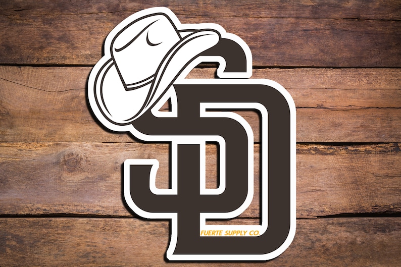 May include: A black and white sticker with a cowboy hat on top of the letters "SD" and the text "FUERTE SUPPLY CO."