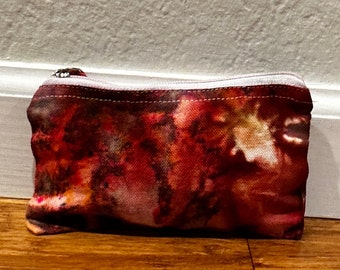 Estuche con cremallera teñido a mano mediante la técnica tie-dye: Bolsa de viaje de algodón