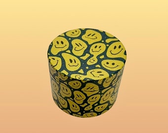 Smiley Herb Grinder 50mm. Yellow smoking accessories.