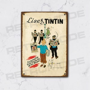 Vintage metal plaque read tintin