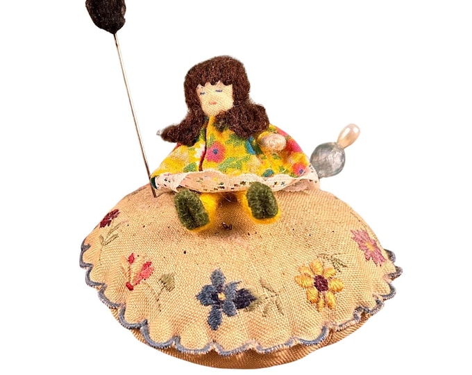 Vintage floral pin cushion with removable handmade doll and two decorative pins/hat pins