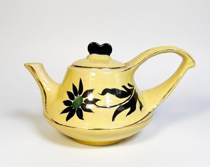 Vintage Yellow Lusterware Teapot: Black Floral Motif, Gold Accents
