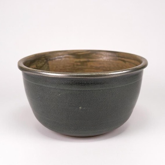 Vintage Studio-made hand-thrown bowl in green glaze, signed by artist