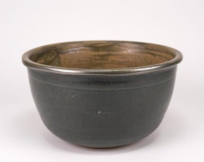 Vintage Studio-made hand-thrown bowl in green glaze, signed by artist