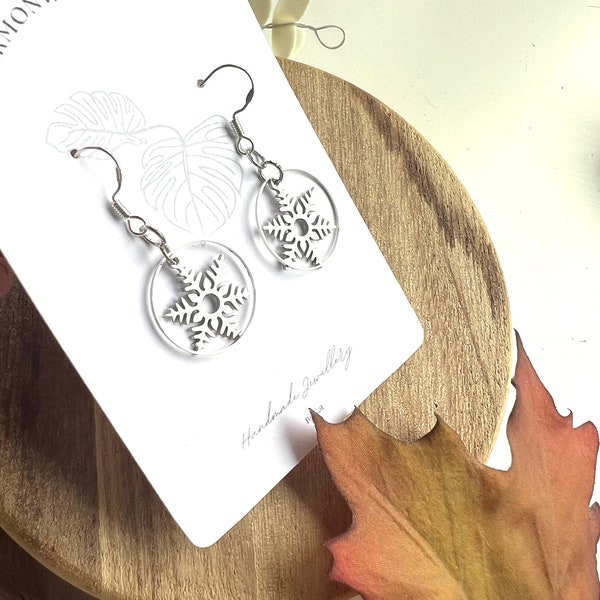 Christmasthemed earrings snowflake silver colored