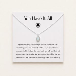 May include: A silver-toned necklace with an oval opal pendant displayed on a white card featuring the text You Have It All, a heart icon, and an inspirational message about inner strength and self-belief printed in black ink.