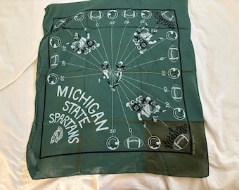 Pañuelo de tela vintage de colores vivos con diseño de los Michigan State Spartans de fútbol americano.
