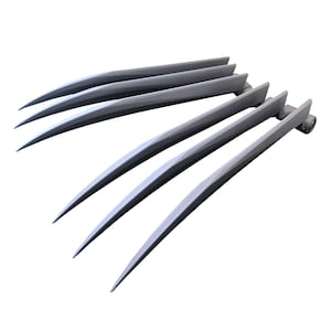 Puede incluir: Un conjunto de seis garras de Wolverine de color plateado. Las garras están hechas de metal y tienen una punta afilada. Están diseñadas para parecerse a las garras del personaje de Wolverine de los X-Men.