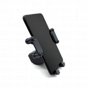 以下が含まれることがあります： 黒いスマートフォンが黒い電話ホルダーに固定されています。 ホルダーには調整可能なアームと安定性のためのベースがあります。 電話の画面は黒く、ホルダーはマットな素材で作られています。