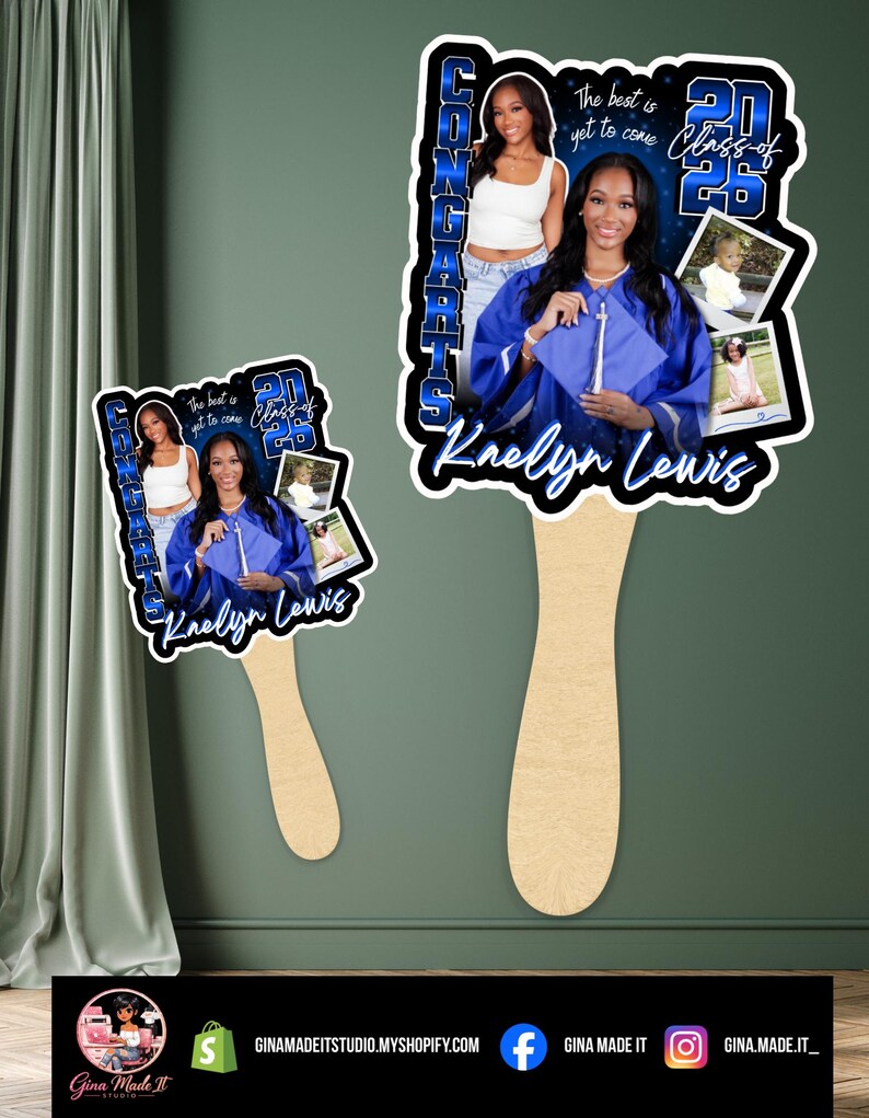 May include: Graduation fan featuring a photo of a graduate in a blue cap and gown, with the text "Congrats" and "Class of 2026". The fan has a wooden handle and includes additional photos. The text "The best is yet to come" is also visible.