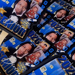 May include: A collection of graduation-themed photo magnets. Each magnet features a portrait of a person in a tuxedo, the year "2026", and the words "Senior" and "Grad". The magnets have a blue and gold color scheme.