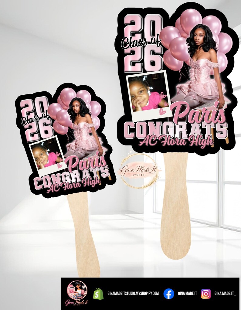 May include: Two graduation fan decorations. Each fan features a photo of a young woman, pink balloons, and the text "Class of 26" and "Paris Congrats AC Flora High" in pink and black. The fans have wooden handles.