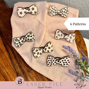 Op de afbeelding: Zes verschillende lasergesneden strikdesigns op een roze stoffen achtergrond. De ontwerpen omvatten sterren, harten, bloemen, stippen en geometrische patronen. De tekst "6 Patterns" is zichtbaar in de rechterbovenhoek van de afbeelding.