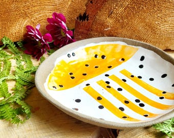 small orange plate, hand-thrown