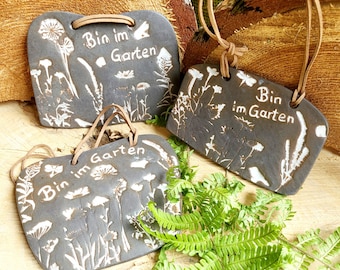 Garden sign "I'm in the garden", with leather strap, hand-thrown.