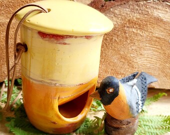 Hanging bird feeder, hand-thrown in pottery