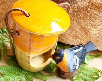 Hanging bird feeder, hand-thrown in pottery