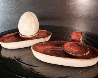 2 egg cups, red, pottery
