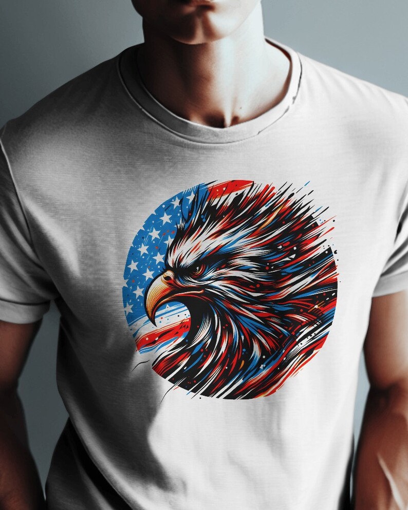 May include: White t-shirt with a graphic of a bald eagle's head in front of a red, white, and blue American flag.