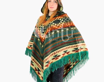 May include: A green, orange, and cream hooded poncho with a geometric pattern and fringe trim.