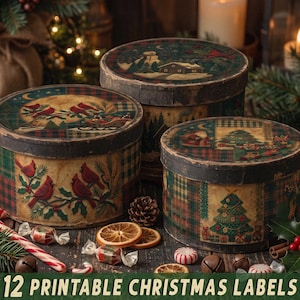 May include: Three round, lidded boxes featuring vintage-style Christmas illustrations of cardinals, a sleigh, a snowman, and a decorated tree. The boxes have a dark, distressed finish and are displayed with holiday decor. Text reads: 12 PRINTABLE CHRISTMAS LABELS.