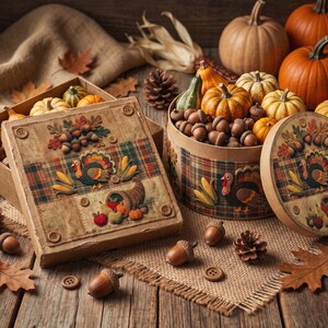 May include: A square and a round cardboard box decorated with fabric patches featuring turkeys, corn, and fruit. The boxes are filled with acorns and small pumpkins, surrounded by pinecones, loose acorns, and autumn leaves on a wooden surface.