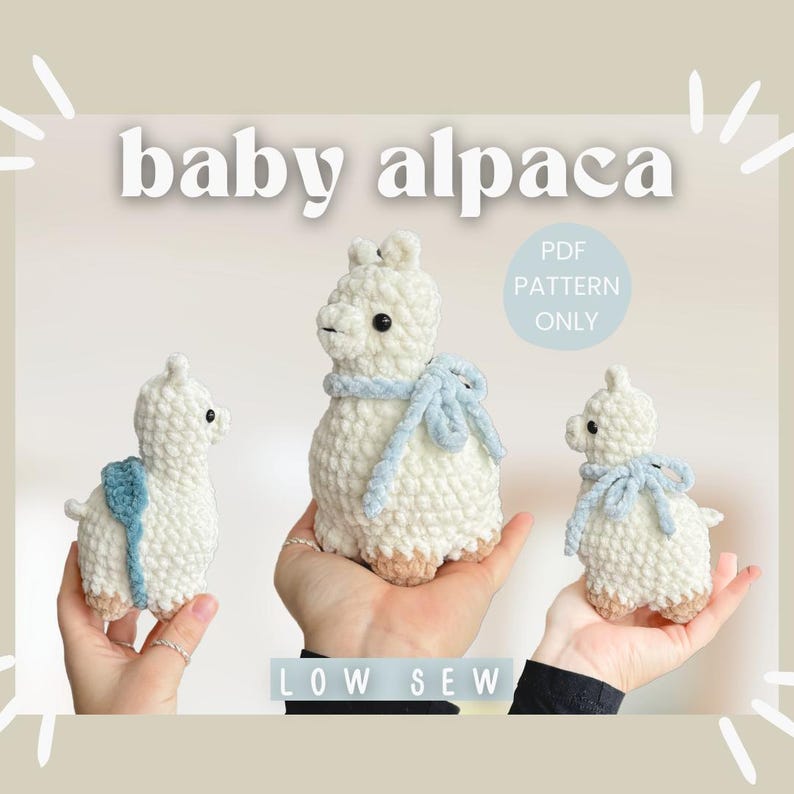 May include: Three crocheted baby alpaca toys with blue ribbon accents. The toys are white and have a fluffy texture. The text "PDF PATTERN ONLY" and "LOW SEW" are visible in the image.