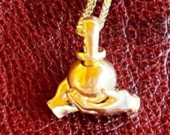 14k Gold Hands Holding Sphere Necklace, Rotating Pendant