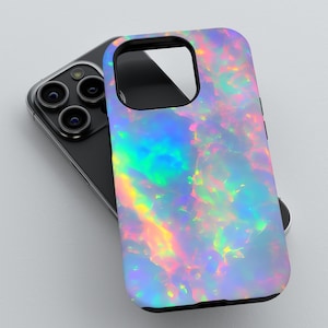 May include: A phone case with a iridescent opal design. The case is made of a hard plastic material and has a black border.