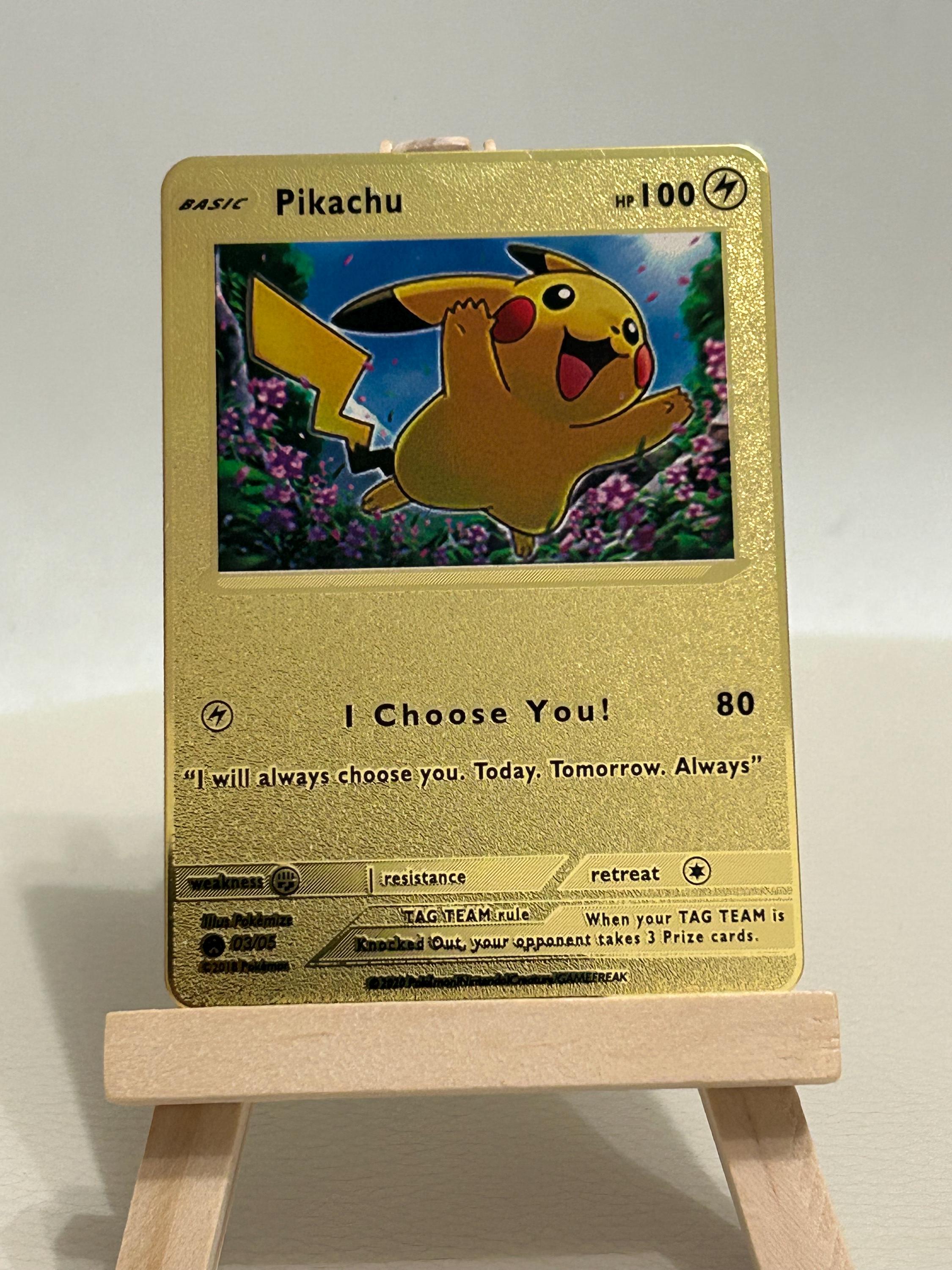 gold metallic pokemon cards pokemon gold plated card the character is Charizard in mint condition