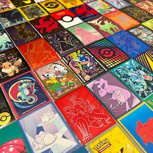 May include: A grid of colourful trading card sleeves, each displaying different Pok&eacute;mon characters and designs. The sleeves are arranged in a neat pattern, showcasing a variety of colours and illustrations, including Pikachu, Charizard, and Eevee. The sleeves are designed to protect trading cards.