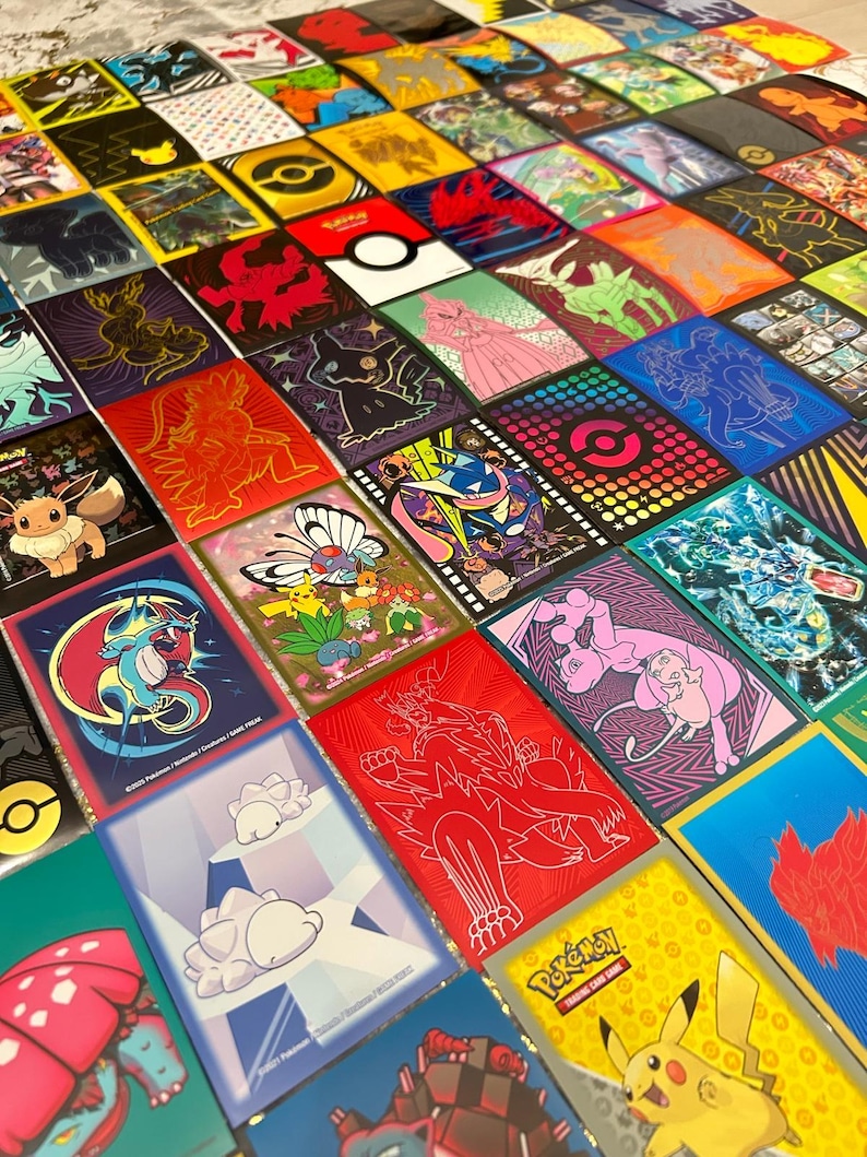 May include: A grid of colourful trading card sleeves, each displaying different Pok&eacute;mon characters and designs. The sleeves are arranged in a neat pattern, showcasing a variety of colours and illustrations, including Pikachu, Charizard, and Eevee. The sleeves are designed to protect trading cards.
