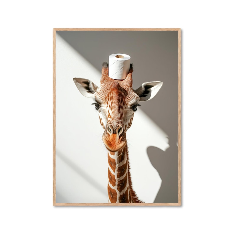 May include: A giraffe with a white toilet paper roll on its head. The giraffe is looking directly at the camera. The background is a white wall with shadows.