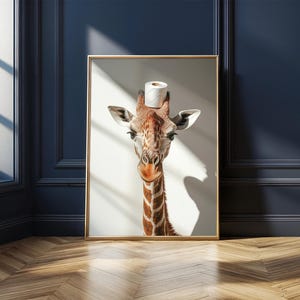 May include: A close-up of a giraffe with a roll of toilet paper on its head. The giraffe is looking directly at the camera. The background is a light blue wall.