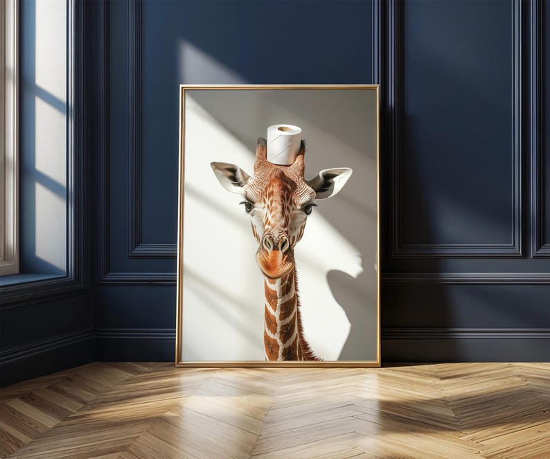 May include: A close-up of a giraffe with a roll of toilet paper on its head. The giraffe is looking directly at the camera. The background is a light blue wall.