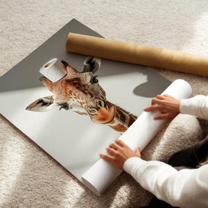 May include: A close-up of a giraffe's head with a toilet paper roll on its head. The giraffe is looking at the camera. The image is printed on a white canvas.