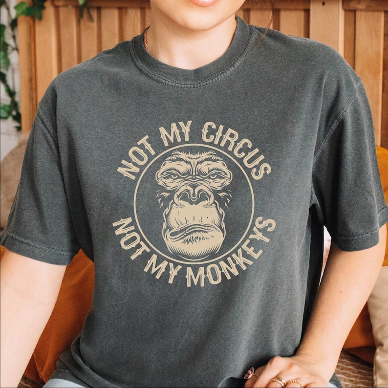 a person wearing a shirt with a monkey on it