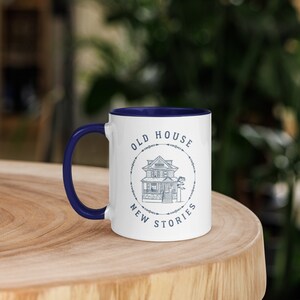 Mug with a crisp navy blue look with an Old House, New Stories meme.  Perfect gift for Old House Enthusiasts and Homeowners as well as housewarming gift.