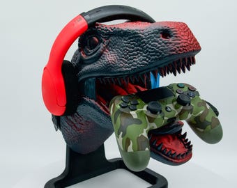 Soporte para auriculares y mando de Raptor impreso en 3D: elegante decoración de escritorio, accesorio para videojuegos, idea de regalo para fans de los dinosaurios y gamers.