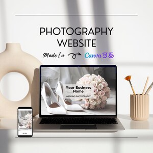 May include: A laptop and smartphone display a wedding photography website design. The laptop screen shows white bridal shoes and a bouquet. Text on the screen reads "Your Business Name" and "Wedding Photography." The image also includes the text "PHOTOGRAPHY WEBSITE Made In Canva."