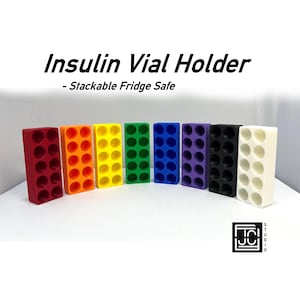 May include: A set of seven stackable insulin vial holders in different colours, including red, orange, yellow, green, blue, purple, and white. The holders are labelled "Insulin Vial Holder - Stackable Fridge Safe".